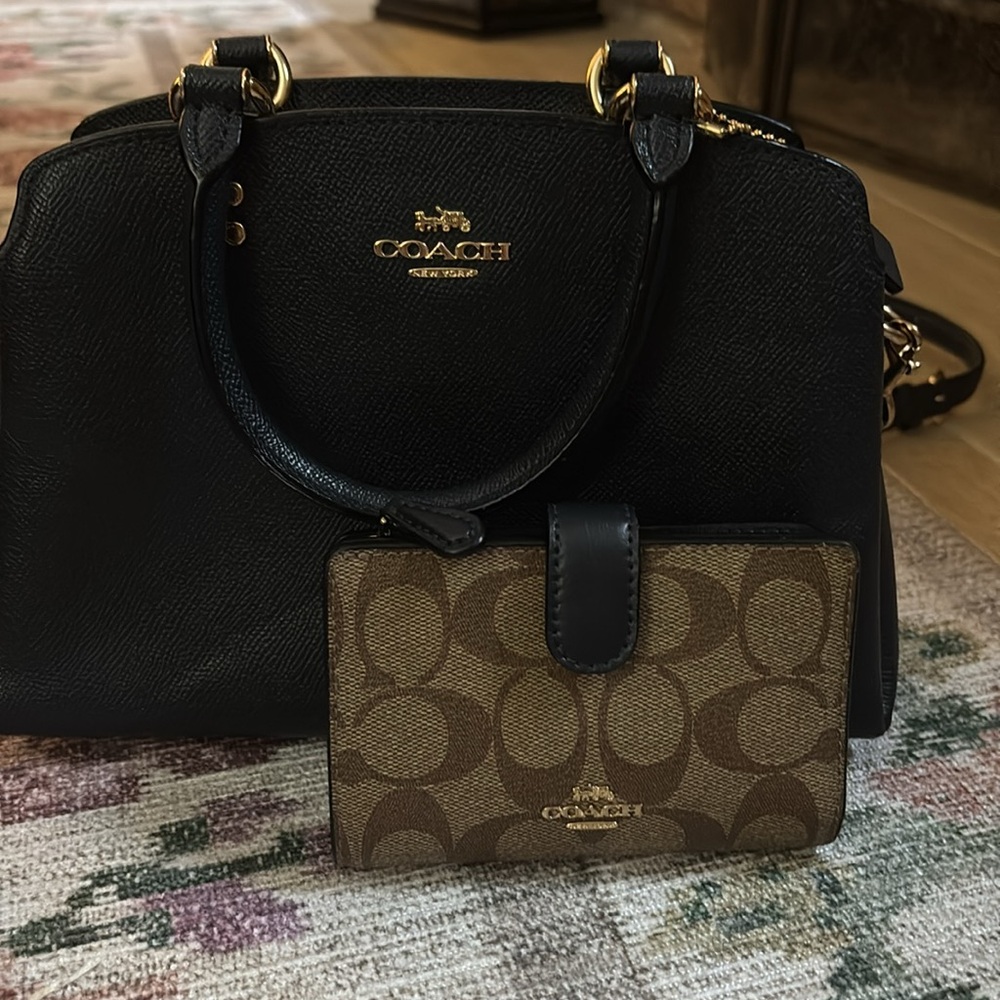 Navy coach bag and matching wallet